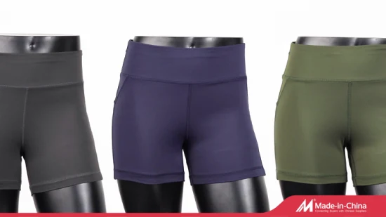 Pantalones cortos de yoga multicolores para correr absorbentes de sudor de levantamiento de cadera de color sólido Yoga deportivo para mujer